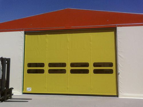 Porte autoréparable - DYNAMICROLL® - B.M.P. srl - à enroulement / PVC / industrielle