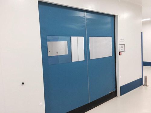 Porte coulissante - B.M.P. srl - à enroulement / en acier inoxydable / PVC