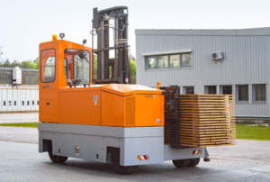 Chariot élévateur latéral électrique - 2150 - HUBTEX - à conducteur porté assis / de manutention / pour l'intérieur