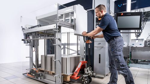 Alimentateur de cartons - TLM Comfort - Gerhard Schubert GmbH - à bande / sous vide / pour machine d'emballage