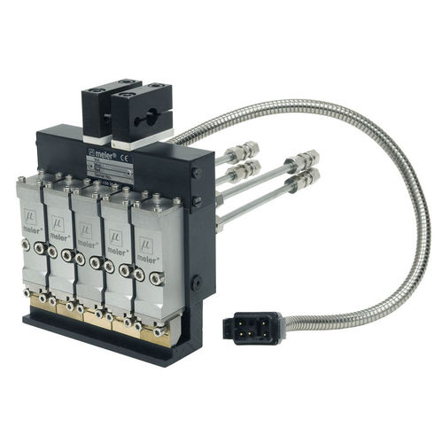 Tête d'application de cordon - Focke Meler Gluing Solutions, S.A - de colle thermofusible