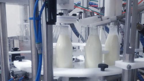 Remplisseuse / boucheuse monobloc - MFC  - PMR System Group - rotative / volumétrique / pour récipients en verre