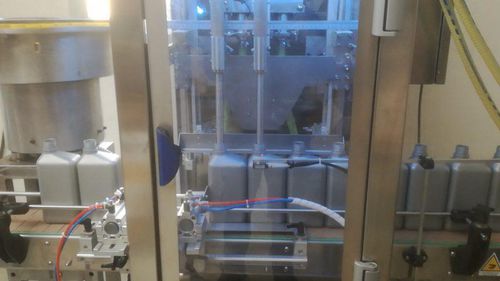 Remplisseuse / boucheuse pour huile - RT2U - PMR System Group - électropneumatique / pour bouchon à visser en plastique / pour réservoir