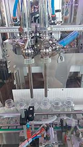 Remplisseuse / boucheuse / étiqueteuse contrôlée par PLC - RTE2U  - PMR System Group - pour liquides / pour l'industrie alimentaire et de la boisson / jus de fruit