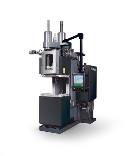 Presse à injecter verticale - D 956 series - DESMA Elastomertechnik - hydraulique / pour élastomères / pour HTV