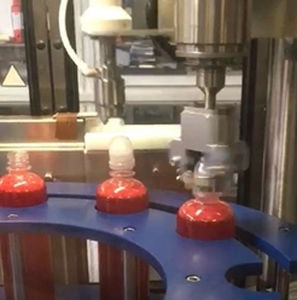 Remplisseuse boucheuse étiqueteuse automatique - MONO 54 - Telm srl - rotatif / de sirop / pour produits cosmétiques
