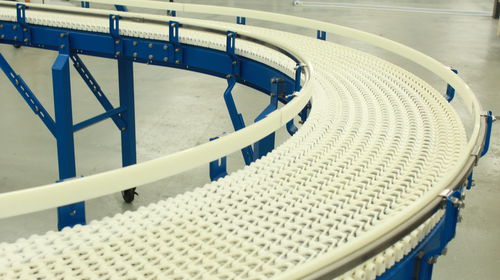 Convoyeur à chaînes - SpanTech - courbe / pour carton / pour l'industrie agroalimentaire