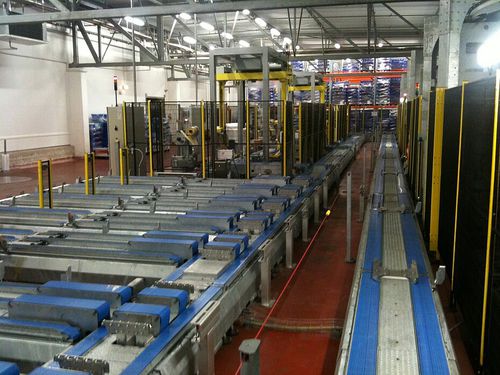 Système de convoyage de transport - Fives Cinetic SAS - pour l'industrie agroalimentaire / de palettes / pour bord