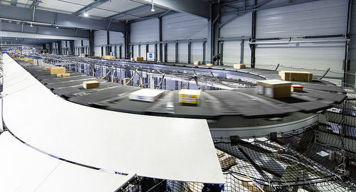 Trieuse à tapis transversal - GENI-BELT™ - Fives Cinetic SAS - automatisée / de manutention / à grande vitesse