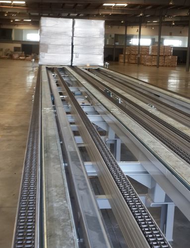 Système de chargement et déchargement automatique - Ancra Systems B.V. - pour palettes / de  camion / avec compacteur