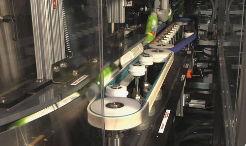 Redresseur de conteneurs rotatif - Cozzoli Machine Company - industriel