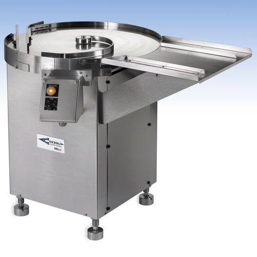 Redresseur de flacons - Cozzoli Machine Company