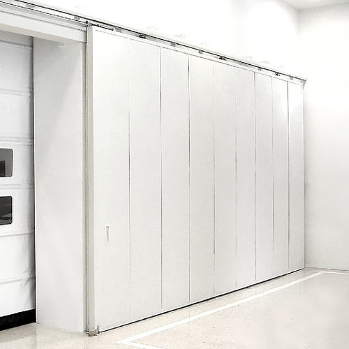 Porte coulissante - PUERTAS FERROFLEX SL - multi-lames / en acier galvanisé / pour l'intérieur