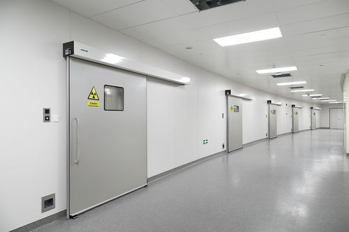 Porte coulissante - PUERTAS FERROFLEX SL - vitrée / en acier inoxydable / plombée