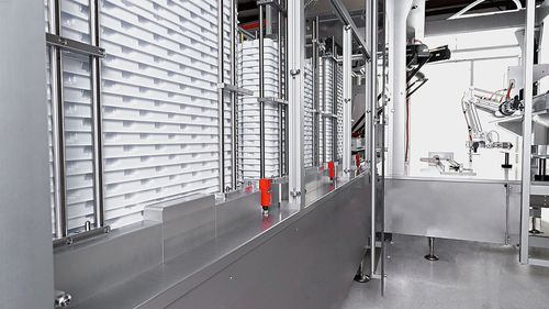 Système de chargement et déchargement de barquettes - Körber Pharma - de seringues / de transport / de manutention
