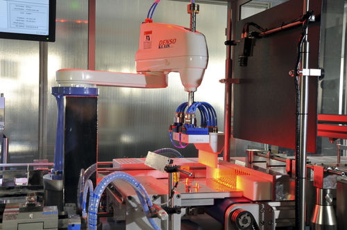 Machine d'emballage semi-automatique - A UNO TEC SRL - sous forme de ligne / en bouteille / pour carton