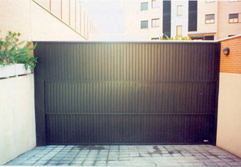 Porte à guillotine - GRI - ALFATECO MADRID S.A. - en métal / industrielle
