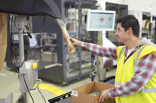 Système de remplissage automatisé - Automated Packaging Systems - de cartons / pour papier / en ligne