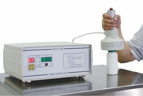 Scelleuse à induction - SF500 - Shanghai Ke Si Packing Machinery Co.,Ltd. - manuelle / pour bouteilles / modulaire