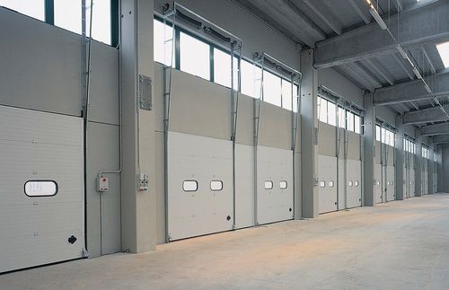 Porte sectionnelle - Dock - Breda Sistemi Industriali S.p.A. - pour quai de chargement / industrielle