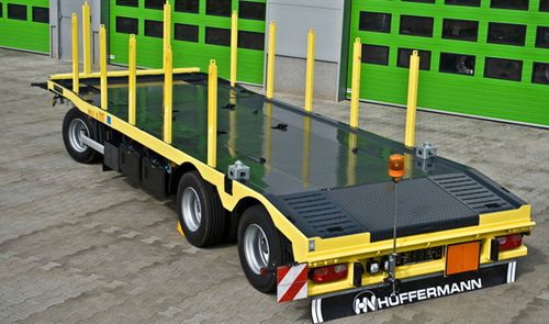Remorque à plateau - Hüffermann Transportsysteme GmbH  - de chantier / à 3 essieux / tractée