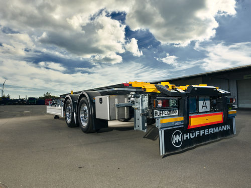 Remorque porte-conteneur - Hüffermann Transportsysteme GmbH  - de chantier / à 2 essieux / tractée