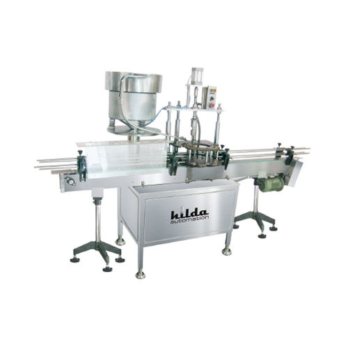 Capsuleuse rotative - M/S. Hilda Automation  - automatique / pour l'industrie agroalimentaire