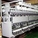 machine de bobinage de fils textiles / de tissus / croisé