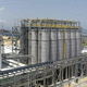 système de transport pneumatique continu / en phase diluée / pour granules / de ciment