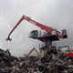 grue pour manutention de déchets et ferraille / fixe / à flèche / tout terrain
