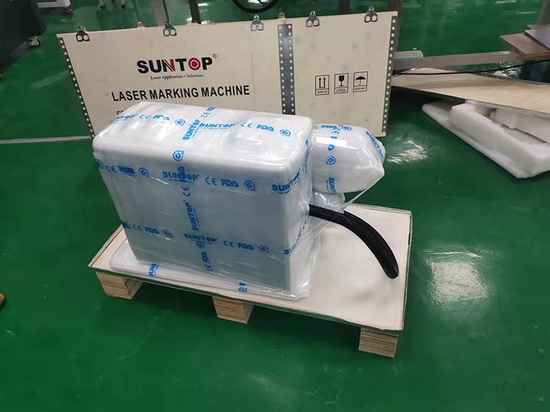 Machine de marquage laser portable achetée par un client colombien : emballage et expédition réussis
